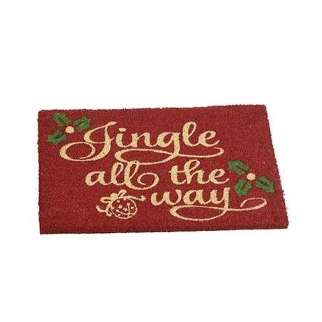 A festive red doormat with golden cursive text and green holly accents.