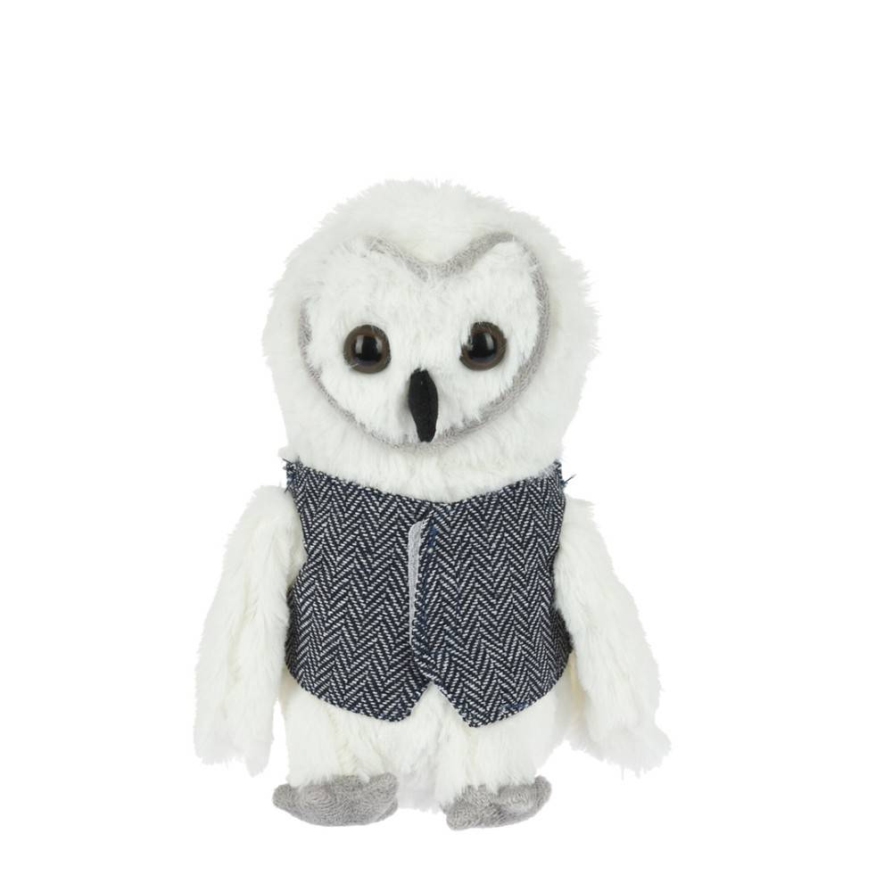 A fluffy white owl plush wearing a textured blue vest, with large expressive eyes.