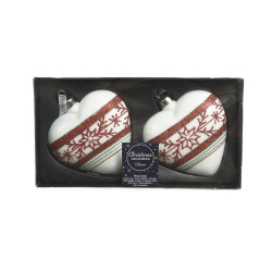 Two heart-shaped ornaments in white, decorated with red and teal patterns, in a black box.