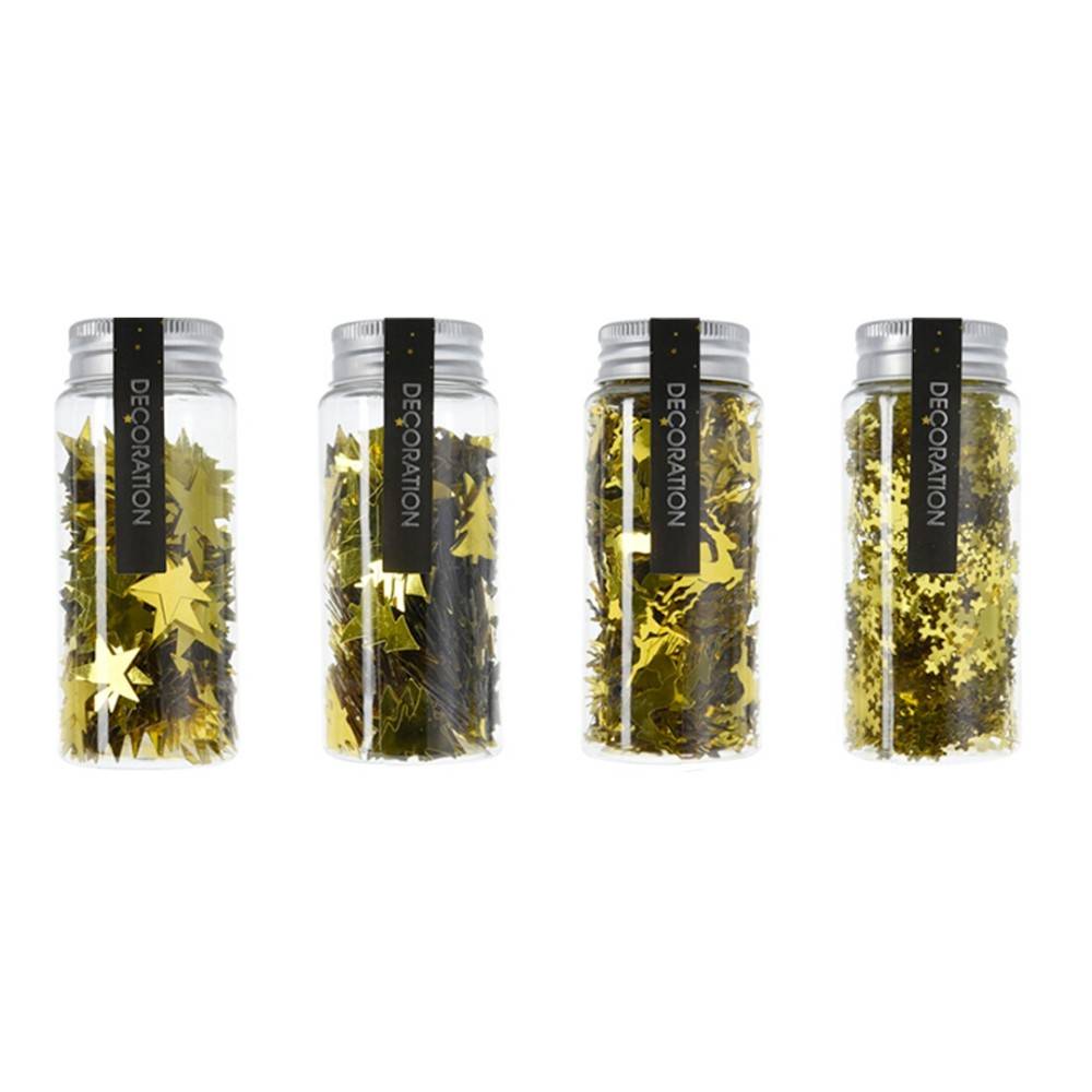Four clear jars filled with gold and black decorative confetti shapes.