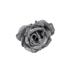 A glittering silver rose with intricate petals, exuding a shimmering elegance.