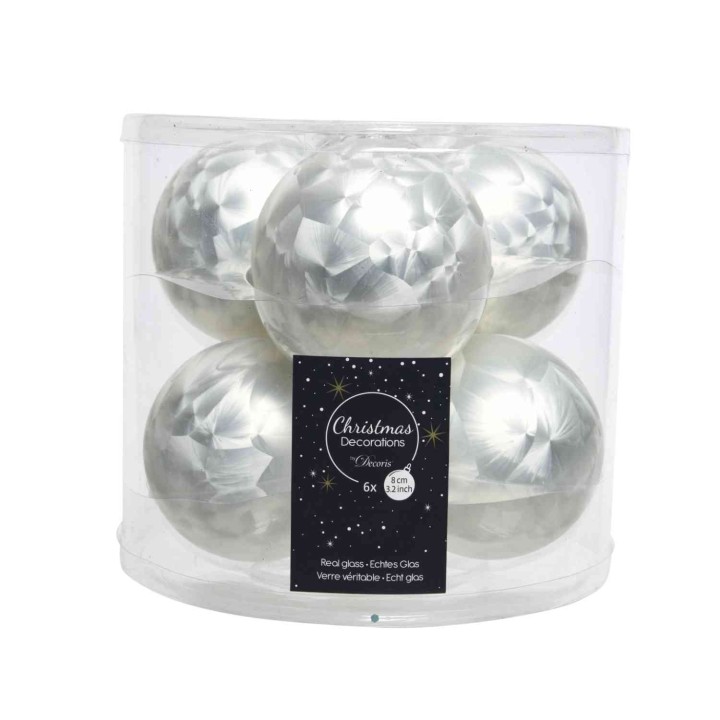 Zes glanzende, zilveren kerstballen in een doorzichtige verpakking met sterrenmotief.