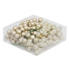 A cluster of shiny, round beads in soft cream and pearl colors, arranged neatly.