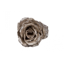 A sparkling, glittery rose in a soft brown hue, radiating elegance and charm.