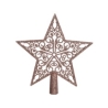 A decorative metal star tree topper with intricate swirling patterns in a warm brown finish.