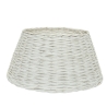 A conical basket made of woven white material, with a textured surface.