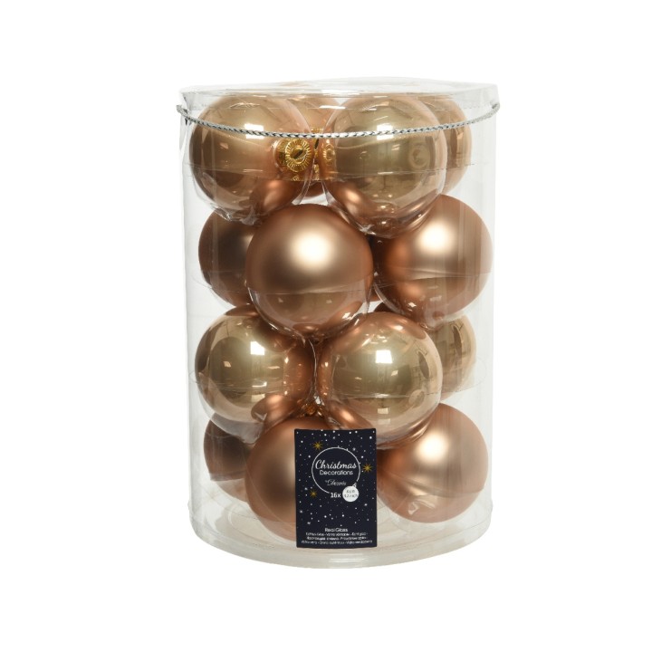 Transparante doos met glanzende, gouden kerstballen in verschillende maten.