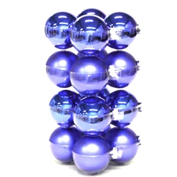A tower of glossy purple spheres stacked in a geometric arrangement.