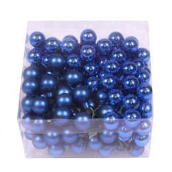 A clear box filled with shiny blue ornaments, some matte and others glittery.