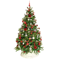 A vibrant green Christmas tree adorned with red and silver ornaments, topped with a star.