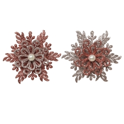 Two ornate brooches, one in shimmering red and the other in silver, each adorned with a central p...