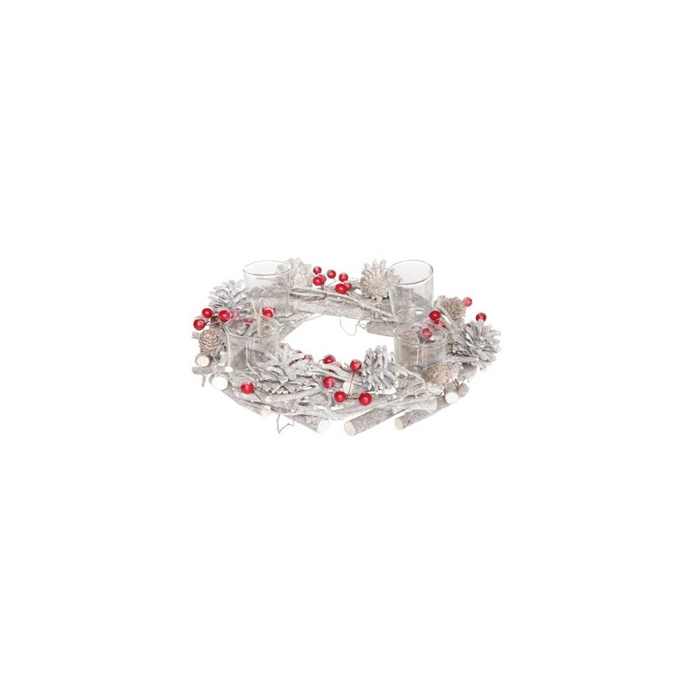 A festive, circular arrangement with white branches, pinecones, red berries, and candle holders.