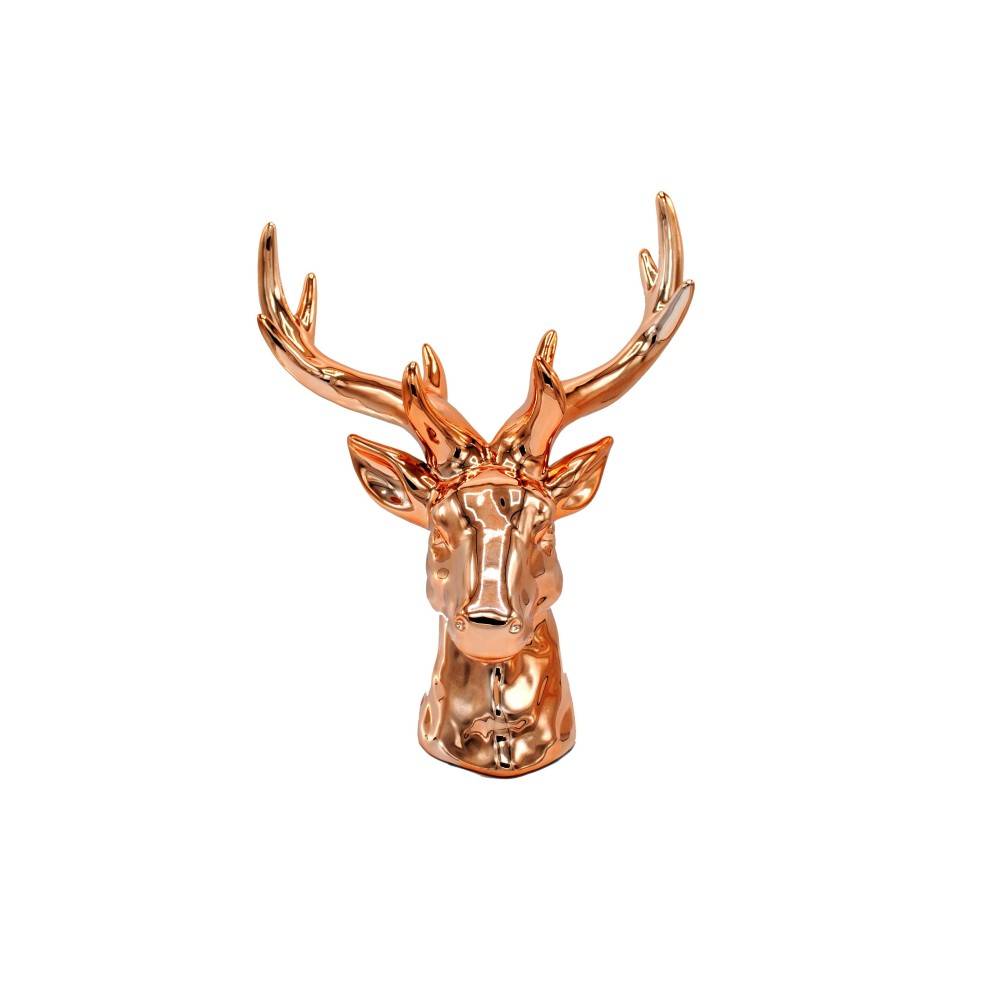 A glossy, rose gold deer bust with intricate antlers, showcasing modern decor style.