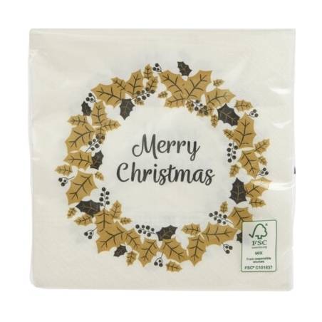 A cream napkin with a golden holly wreath and "Merry Christmas" in elegant script.