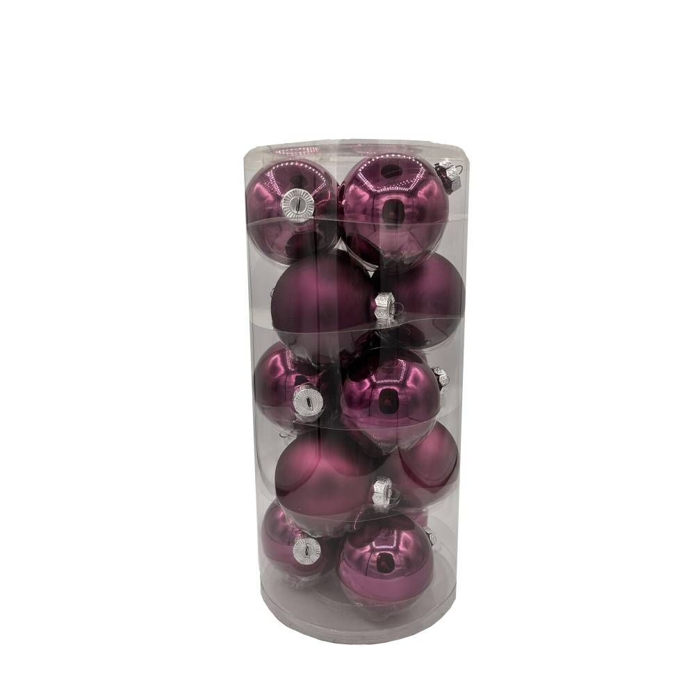 A clear cylindrical container filled with shiny purple Christmas ornaments.