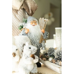 A whimsical winter scene featuring a cheerful Santa with fluffy white animals and pinecones.