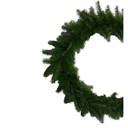 A lush green wreath made of pine branches, full and circular in shape.