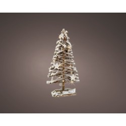 A snowy, star-adorned Christmas tree with a rustic wooden base, softly glowing.