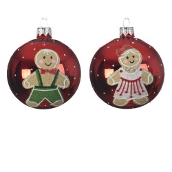 Twee rode kerstballen met glitterfiguren van een jongen en meisje in feestkleding.