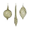 Three delicate glass ornaments in muted green hues, featuring varied shapes and swirling designs.