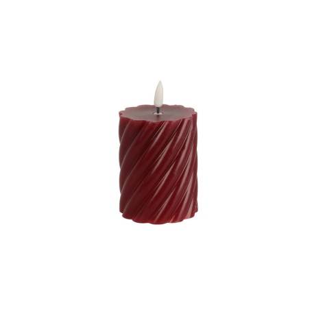 A deep red candle with a twisted texture and a small white wick on top.