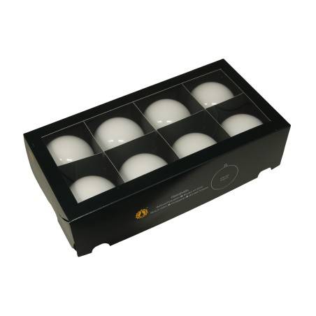 A sleek black box containing nine smooth, white spherical objects arranged neatly.