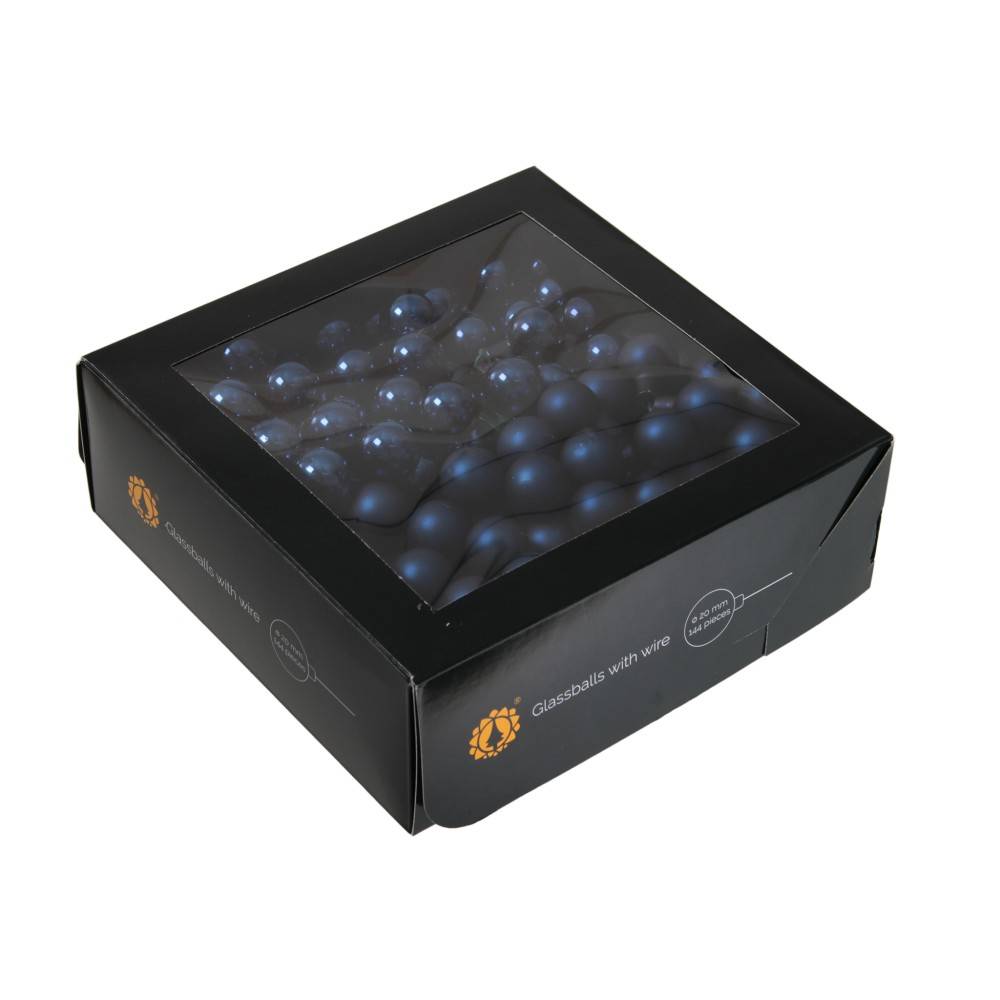 A black box with a clear lid, filled with round dark blue candies.