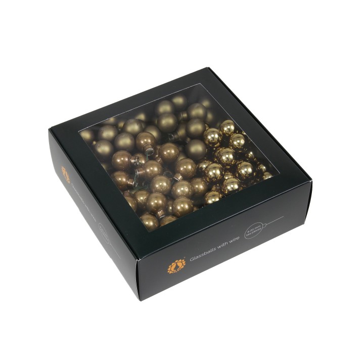 Een zwarte doos met een doorzichtige bovenkant, vol gouden kerstballen van verschillende maten.