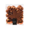 A clear box contains shiny orange ornaments and a glittery star, perfect for festive decor.