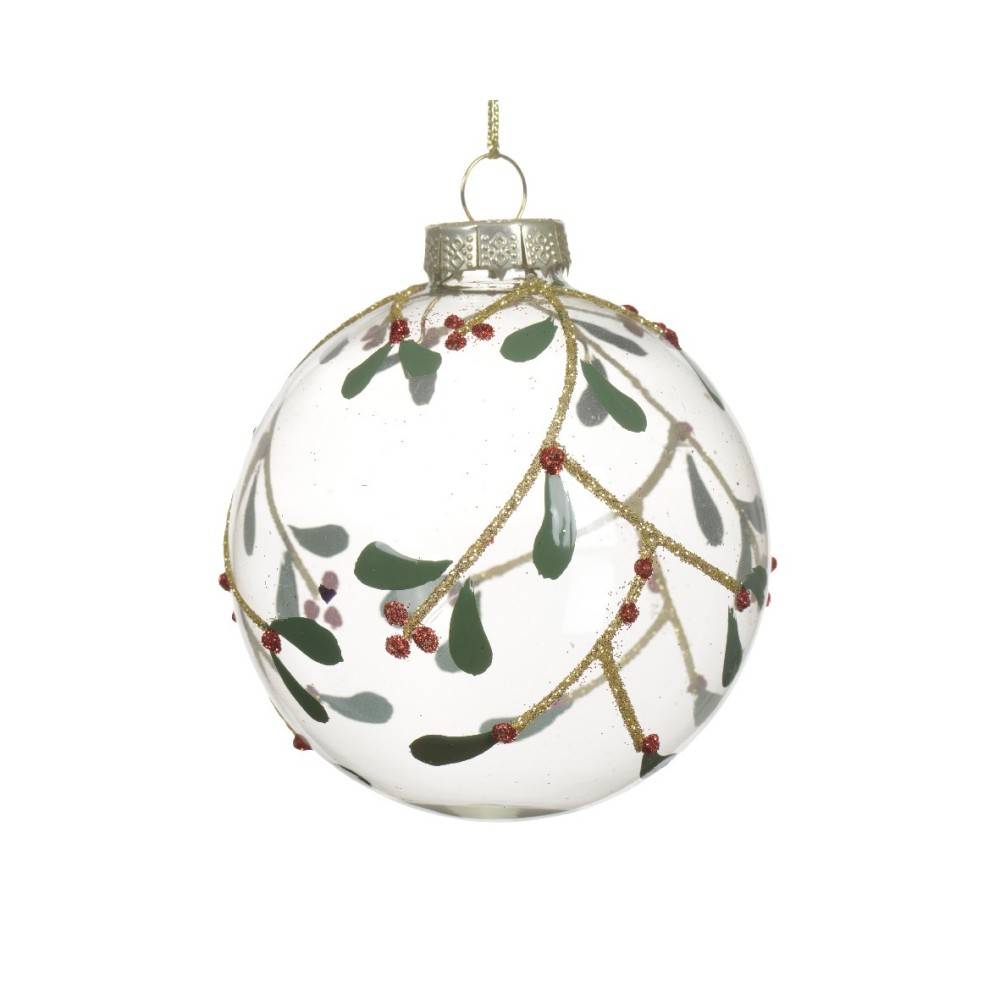 A clear glass ornament adorned with green leaves and red berries, accented with gold glitter.