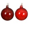 Two glossy red glass ornaments with swirling patterns and small loops for hanging.