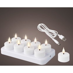 A set of ten white LED candles on a charging base, flickering softly against a dark background.