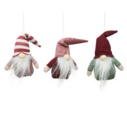 Drie schattige kerstgnomes met verschillende hoeden en lange witte baarden, in zachte kleuren.