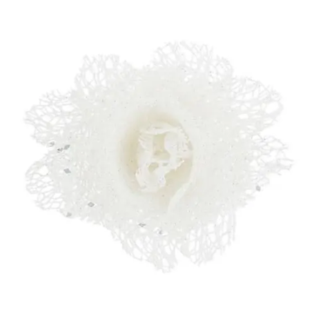 Delicate white lace flower with a central design, shimmering subtly.