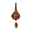 A decorative, elongated ornament in rich red with gold intricate designs and a pointed bottom.