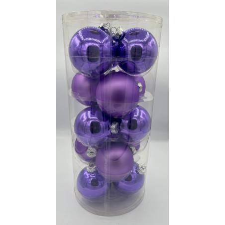 A clear cylinder filled with shiny purple Christmas ornaments of varying sizes.