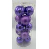 A clear cylinder filled with shiny purple Christmas ornaments of varying sizes.