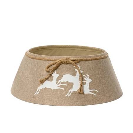 A beige fabric tree skirt with white leaping deer and a tied rope detail.