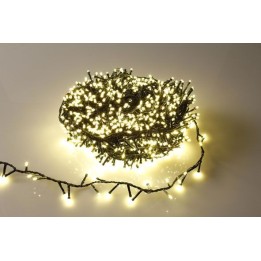 A tangled bundle of warm white fairy lights on a light background.