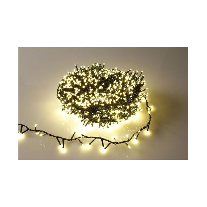 Een wirwar van warme, witte lichtjes op een donkerbruine draad, in een ronde vorm.