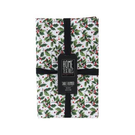 A festive table runner with a white background, adorned with green holly leaves and red berries.