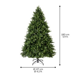 A tall, lush green artificial Christmas tree with a black metal stand.