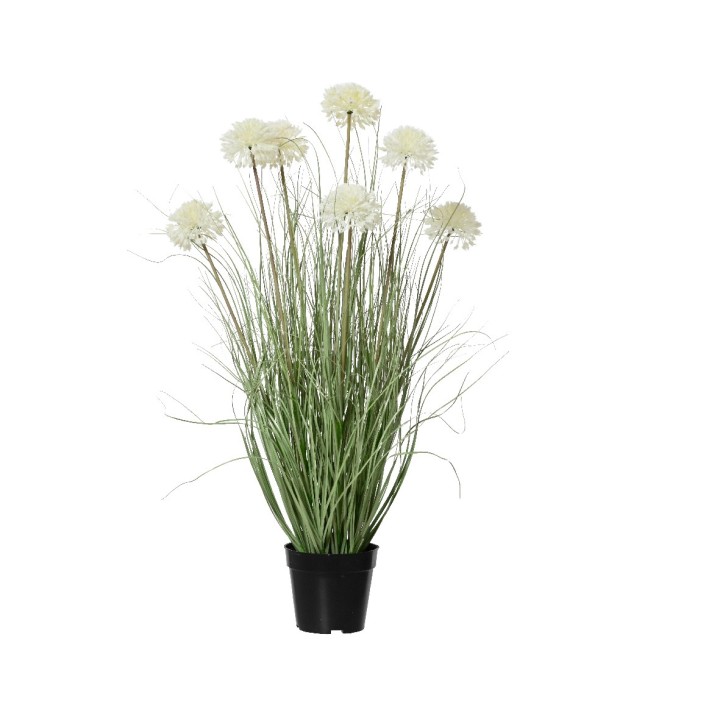 Een kunstplant met lange groene stelen en witte bloempjes in een zwarte pot.