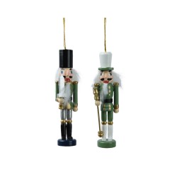 Two colorful nutcracker ornaments with tall hats and festive attire, hanging by golden strings.
