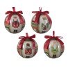Four decorative Christmas ornaments featuring nutcracker designs, each with red bows.