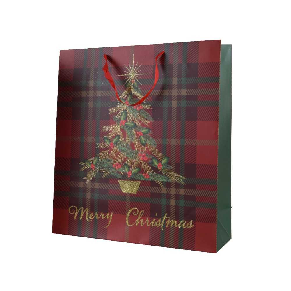 A festive red and green gift bag featuring a decorated Christmas tree and "Merry Christmas" text.