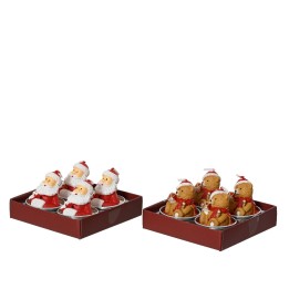 Festive figurines of Santa and gingerbread in a red box, joyful holiday decorations.
