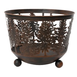 A rustic metal basket with intricate tree cutouts and rounded feet.