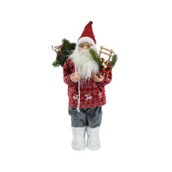 A festive Santa figure in a red patterned sweater, gray pants, and white boots, holding a sled.