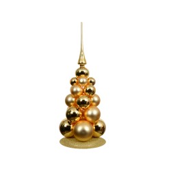 Gouden kerstboom van glanzende bollen met een sprankelende basis en een elegante piek.